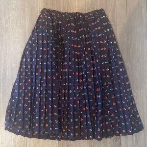 Navy Pleated Skirt with Colorful Details.